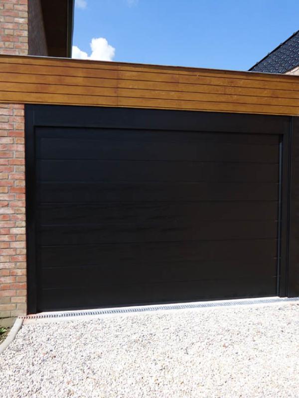 Porte sectionnelle monorainure coloris noir